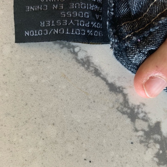 Super Cute Jean skirt with tie in the front. Zipper on the side. Some stretch. - Picture 4 of 4